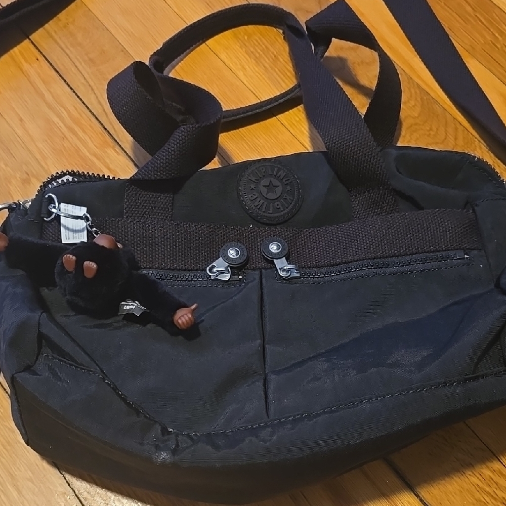 Kipling Black Satchel with Durable Fabric and Zipper Closure